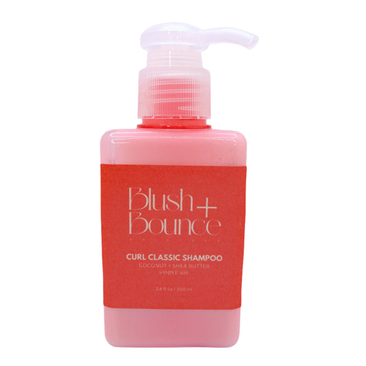 Shampoo bottle labeled 'Blush + Bounce' on a white background